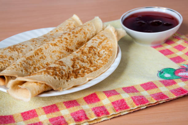 istock Delicious pancakes on a plate with strawberry jam 648356664