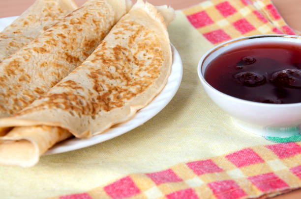 istock Delicious pancakes on a plate with strawberry jam 648358766