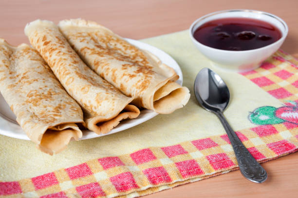 istock Delicious pancakes on a plate with strawberry jam 648358772