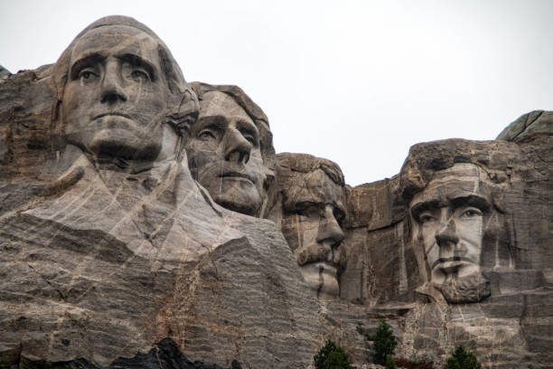 Mount Rushmore National Memorial, South Dakota Mount Rushmore National Memorial is a sculpture carved into the granite face of Mount Rushmore in South Dakota, United States keystone south dakota photos stock pictures, royalty-free photos & images