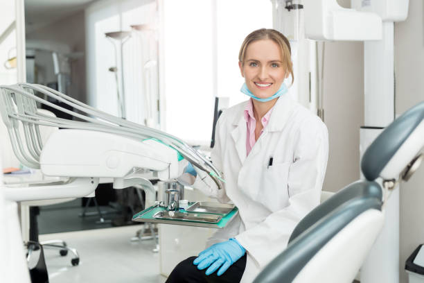 istock Young smiling female dentist doctor 648360202
