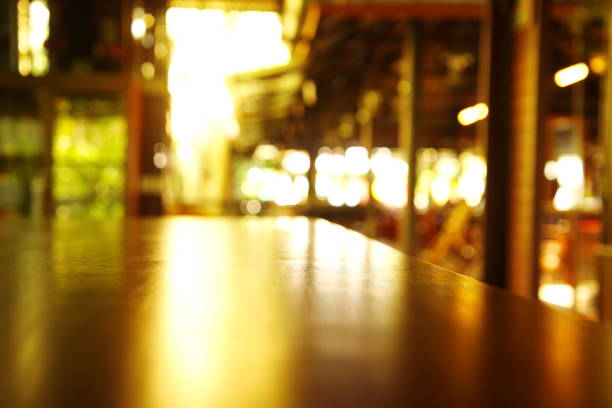istock top of wood table in blue restaurant or cafe 648366548