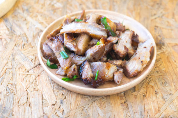 istock Charcoal boiled pork neck on wood dish 648369730