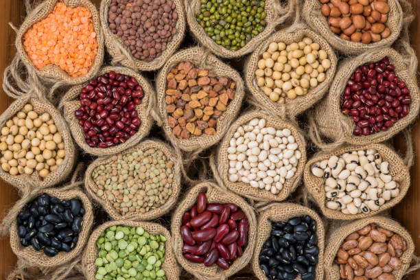 istock Top view multicolor dried legumes in sack cloth 648380726