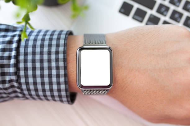 istock man hand and Watch with isolated screen 648385670