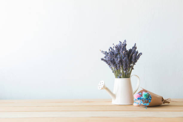 istock Indoor plant on wooden table and white wall 648388754