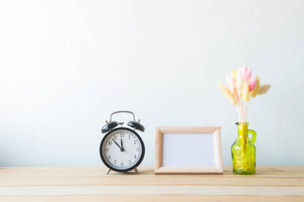 istock Indoor plant on wooden table and white wall 648389172