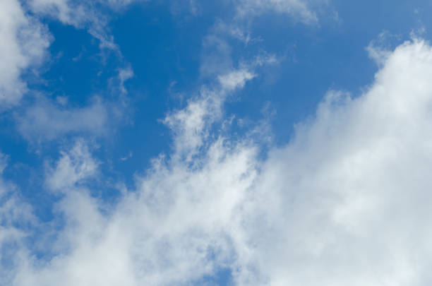istock beautiful blue sky with gorgeous white clouds 648396196