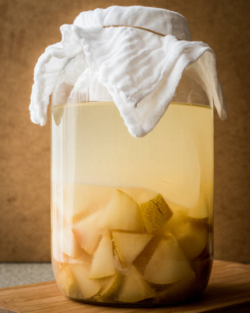 istock Homemade Pear vinegar or juice in bottle. 648401718