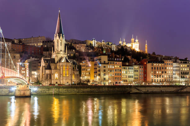 istock Famous church in Lyon with Saone river 648405310