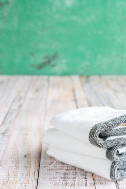 istock towels on the Wooden in bathroom 648412184