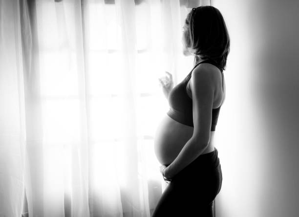 istock Mom looks out the window 648413298