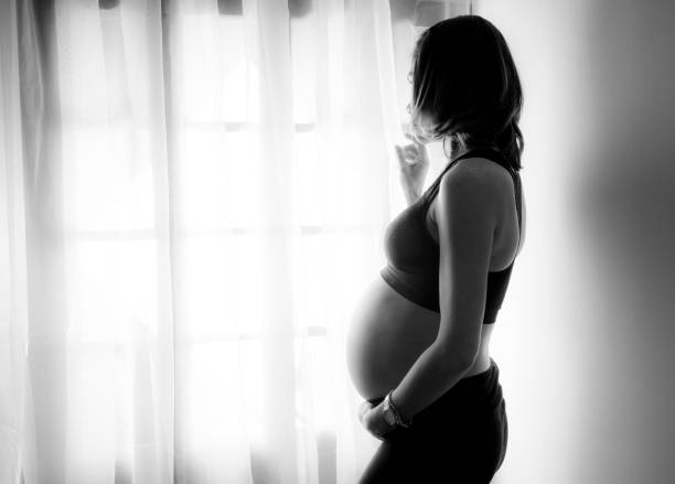istock Mom looks out the window 648416356