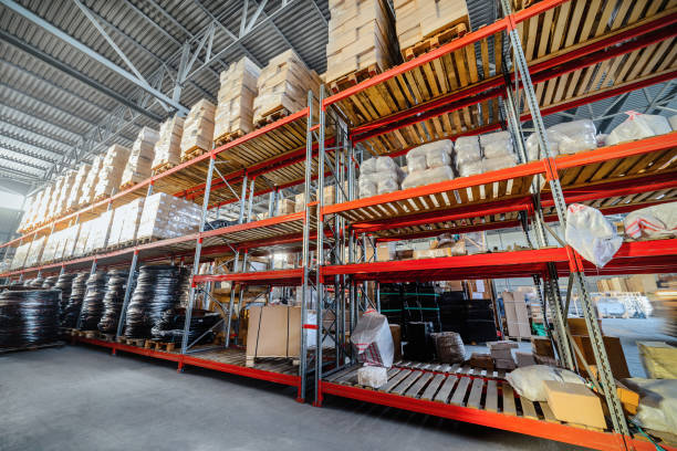 istock Long shelves with a variety of boxes and containers 648418870