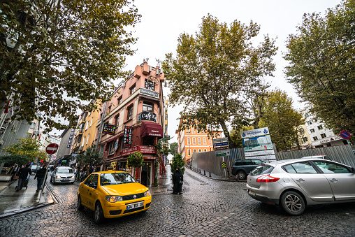 Istanbul, Turkey - October 27, 2014: Cars and people on Istanbul street.