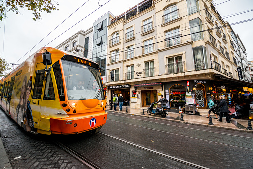 Istanbul, Turkey - October 27, 2014: Tramway and people on Istanbul street.