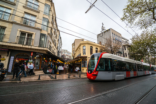 Istanbul, Turkey - October 27, 2014: Tramway and people on Istanbul street.