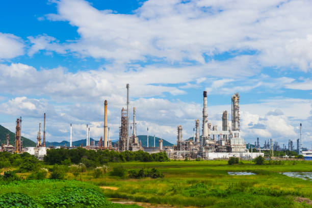 istock Oil Refinery factory industry with blue sky and clouds. 648419964
