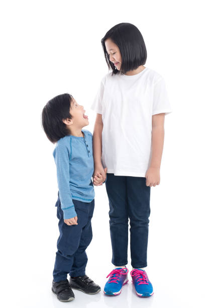 istock Asian children holding hand together 648420970