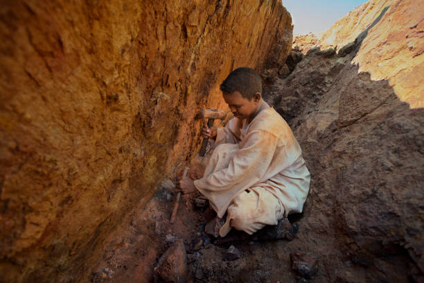 Men working in  gold mine north Sudan, 1,December 2007