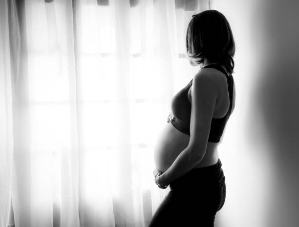 istock Mom looks out the window 648433660