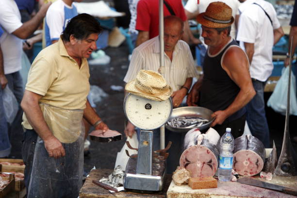 The Fishmarket in the old Town of Catania in Sicily in south Italy in Europe.