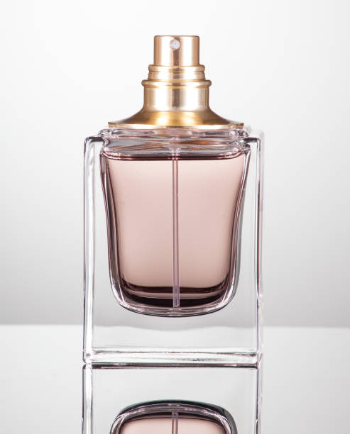 istock woman perfume on gray background 648446038