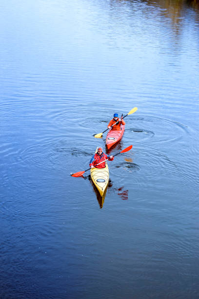 Journey down the river on a sunny day in a canoe.