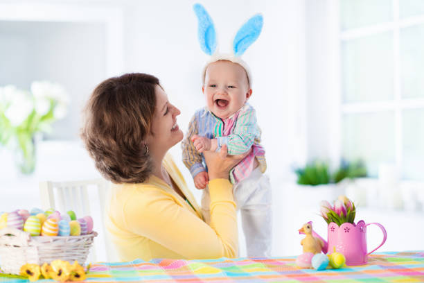 istock Mother and child celebrating Easter at home 648453472