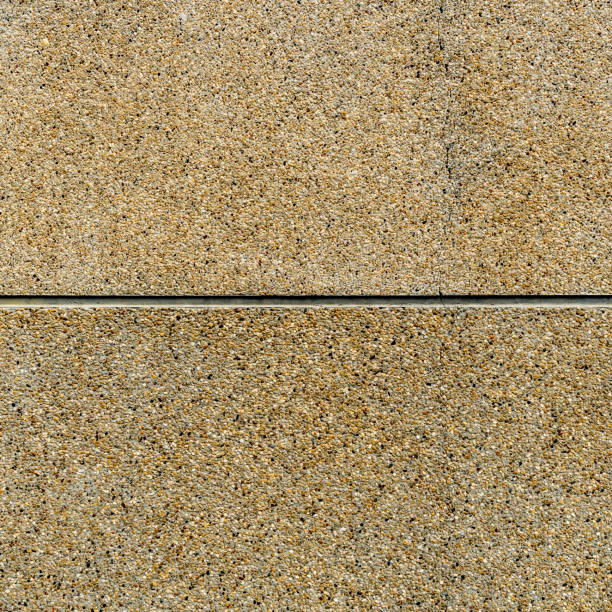 Brown concrete small gravel texture