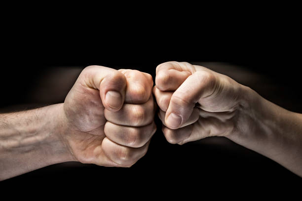 istock clash of two fists 648470994