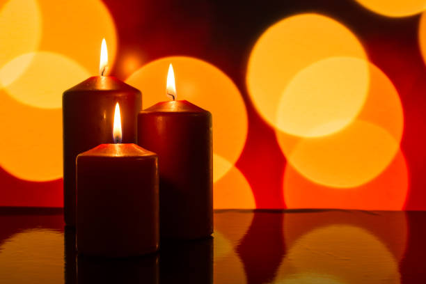istock Red candles and lights as bokeh 648473830