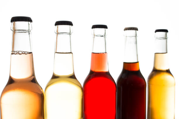 istock Colourful lemonades in glass bottles 648477998