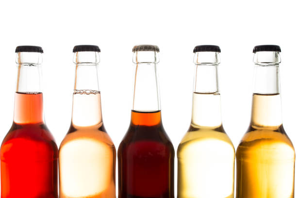istock Lemonades and cola in glass bottles 648478092