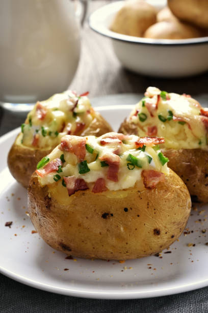istock Baked potato with bacon and cheese 648478602