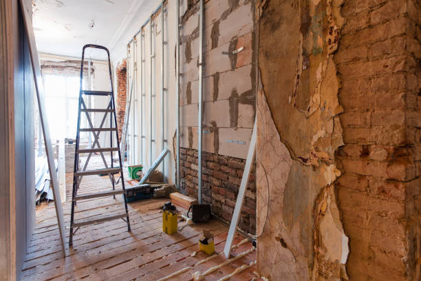 istock Interior of apartment with materials during on the renovation and construction ( making wall from gypsum plasterboard) 648478790