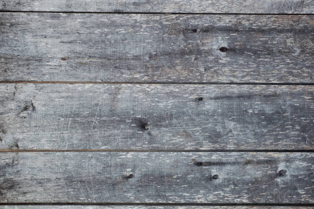 istock Gray weathered shabby wooden board for text 648478862