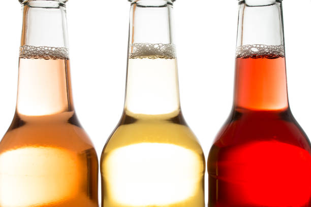 istock Colorful fresh lemonade in bottles with foam 648480998