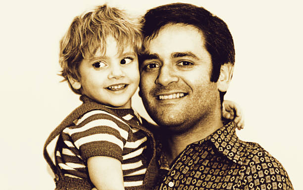 istock Father with child - grainy black and white 648486828