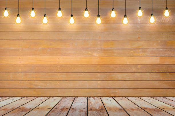 istock wood wall with bulb lights lamp. 648499548