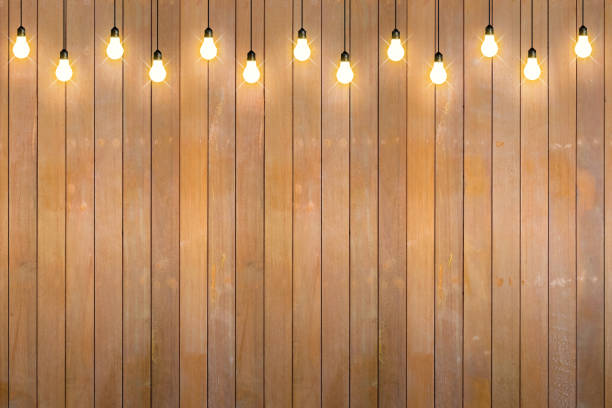 istock wood wall with bulb lights lamp. 648499662