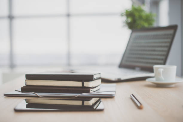 istock Office workplace with laptop and on wood table. 648500836