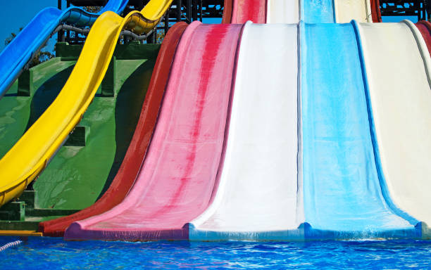 istock Colorful plastic water-slides in aqua park. 648501200