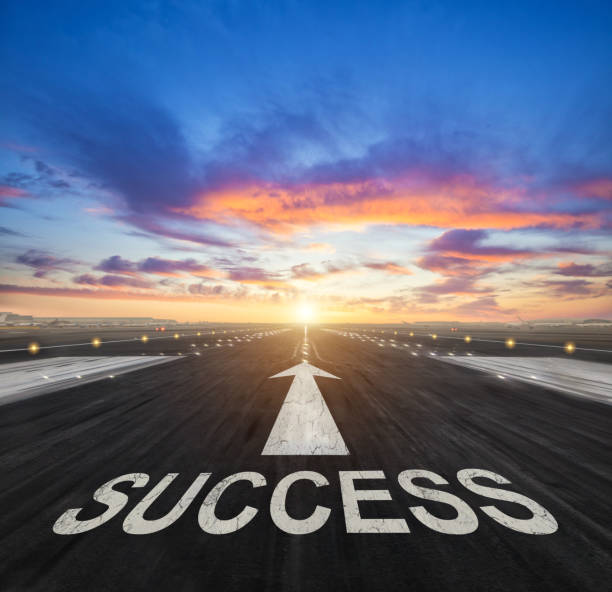 istock Success creative concept with airport runway 648506064