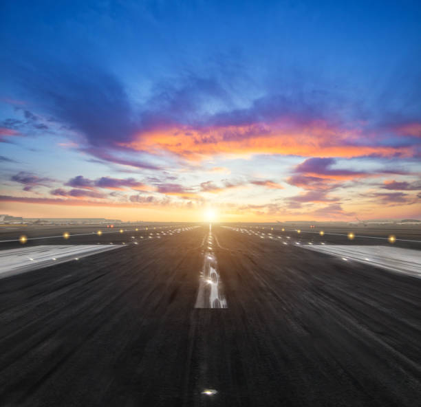 istock airport runway in the evening sunset light 648506232