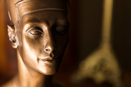 Nefertiti was called the Great Royal Wife since she was married to the Egyptian Pharaoh Akhenaten. Not a luxury object since it was molded in plaster and spray painted after.