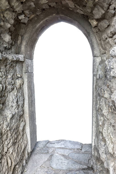 istock Stone wall with open door and copy space behind 648506808