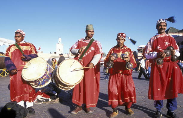 AFRICA MOROCCO MARRAKESH Traditional Music player at the Djemma del Fna Square in the old town of Marrakesh in Morocco in North Africa."n djemma el fna square stock pictures, royalty-free photos & images