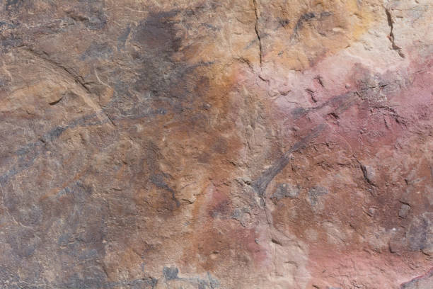 istock Textured surface of colorful rock 648510058