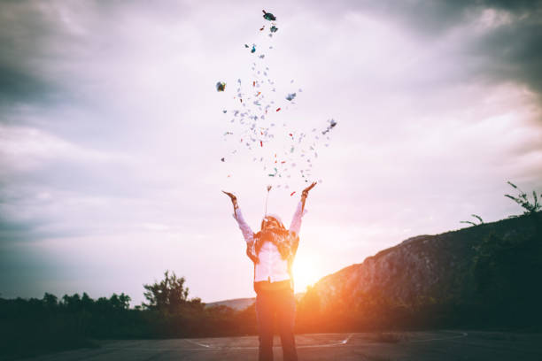 istock Cute hipster girl throwing confetti 648510154